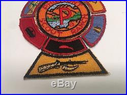 1950s PHILMONT ROUND PATCH withSEVEN SEGMENTS INCLUDING MOUNTAIN MAN NEW MEXICO
